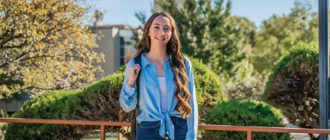 Marissa Steben smiles at camera standing outside